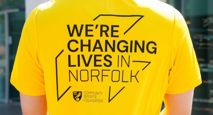 we're changing lives in norfolk sign