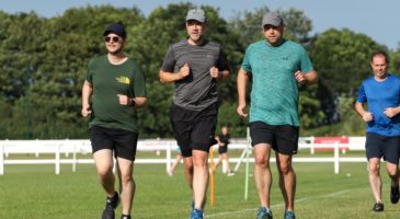 three men running 
