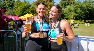 Two women in the race village