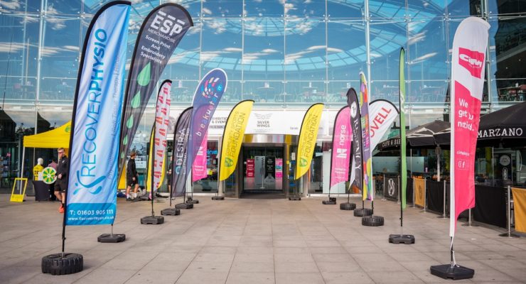 sponsorship flags outside The Forum