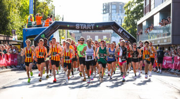 group of men running road race