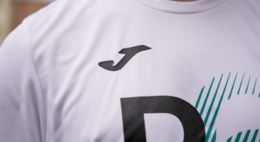 Focusing on the detail of the white tshirt