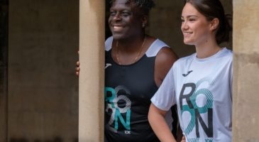 man and woman wearing a run norwich race day top