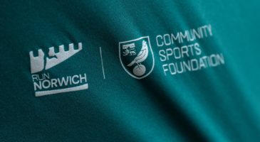 close up of top show run norwich and community sports foundation logos